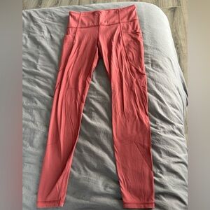 Athleta Stash Pocket Salutation Tight